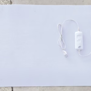 Calentador bajo alfombra con un interruptor Herga Energy con tres niveles de potencia y desconexión automática.